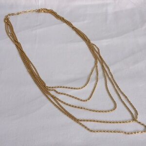 Layered 5 chain gold tone long spiral link necklace